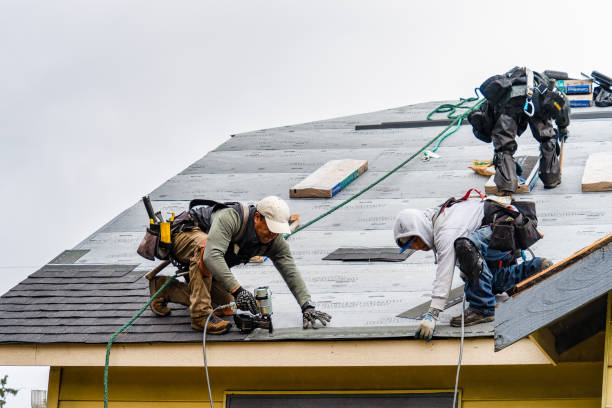 Professional Gutter Installation technician working in Harperville, MS